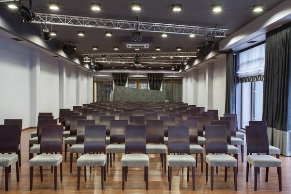 Woodland hotel - Conference hall with neatly arranged seats Image: Shutterstock